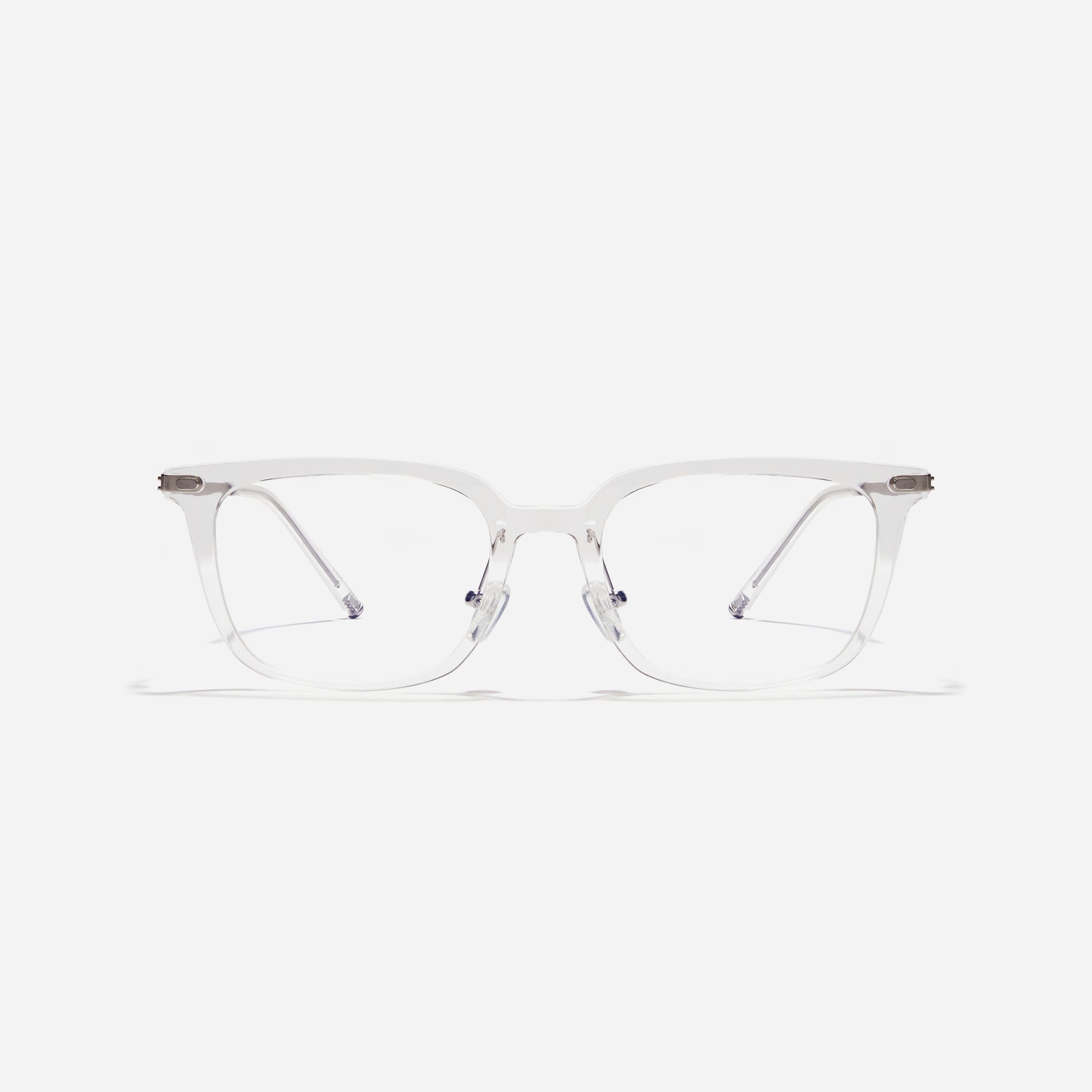 Square-shaped combination eyeglasses from CARIN's 'Feather Fit' line. Their combination frame seamlessly blends bio-plastic and titanium, utilizing advanced injection molding technology, often seen in the manufacturing of cell phones and watches.