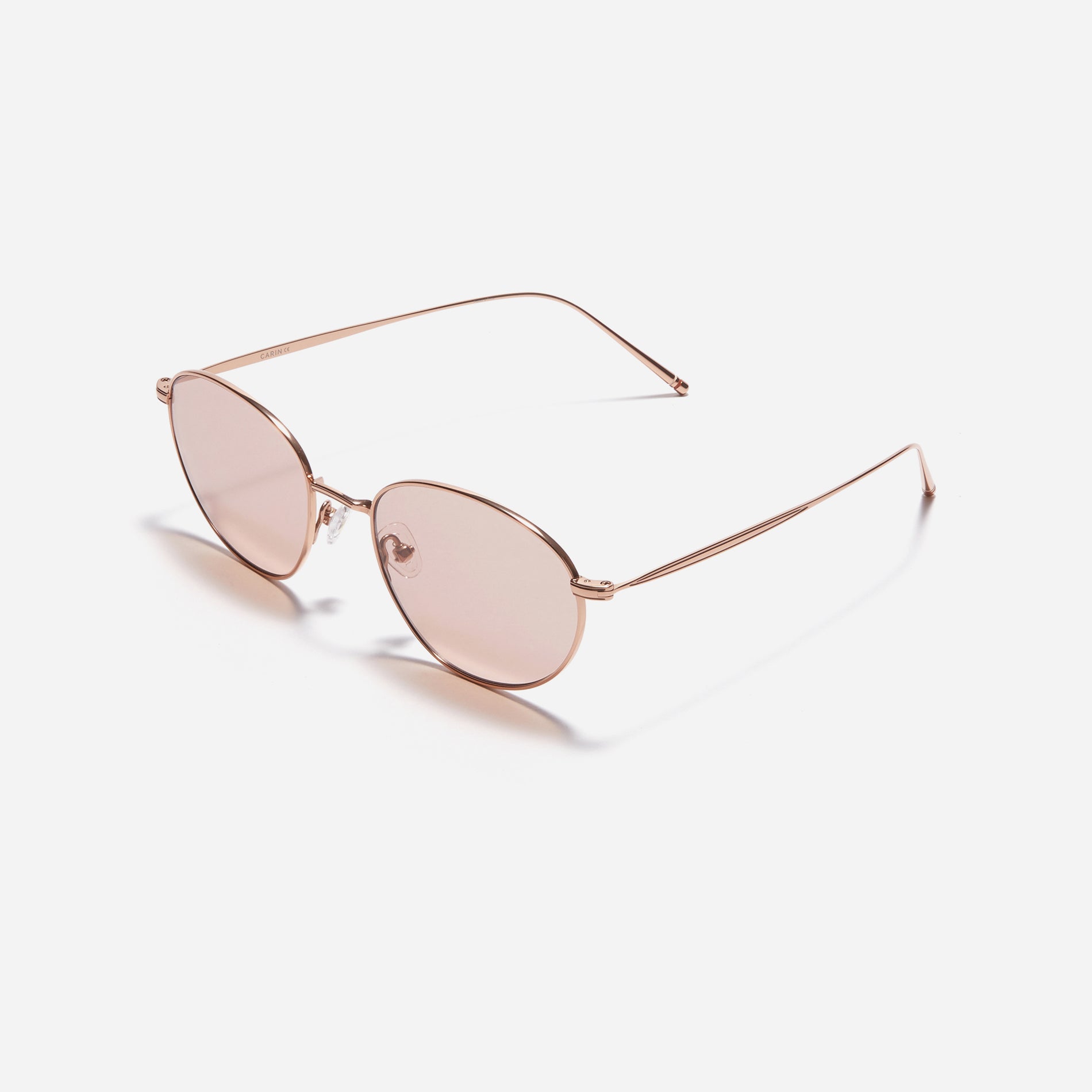 Idell sunglasses feature sleek metal frame with a narrow design. Crafted entirely from titanium, they guarantee a lightweight and comfortable fit. Available in color variations that naturally complement facial features, they provide a soft and versatile style for everyday wear.