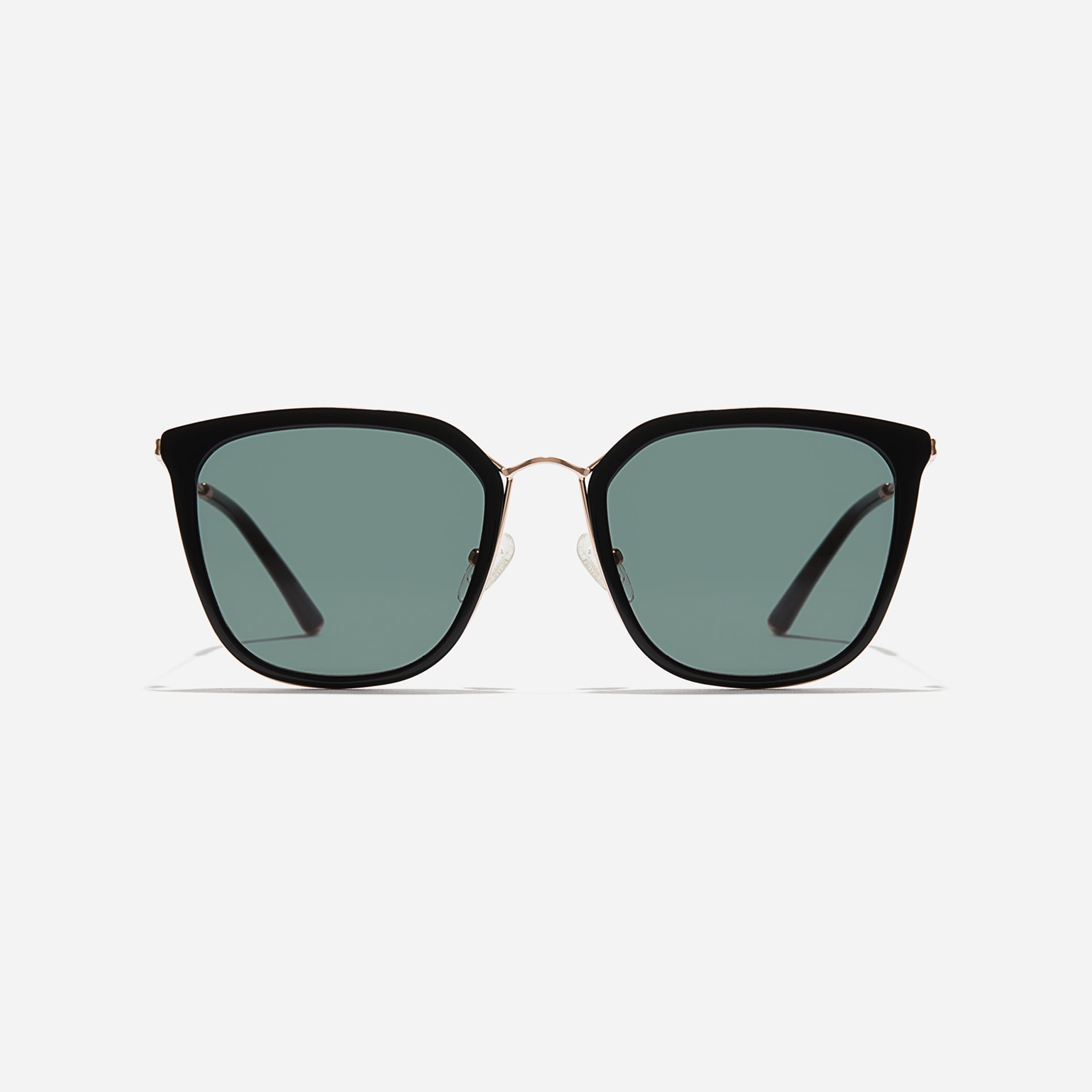 Combination sunglasses featuring flat lenses that ensure 100% UV protection, and unique nose bridge details.