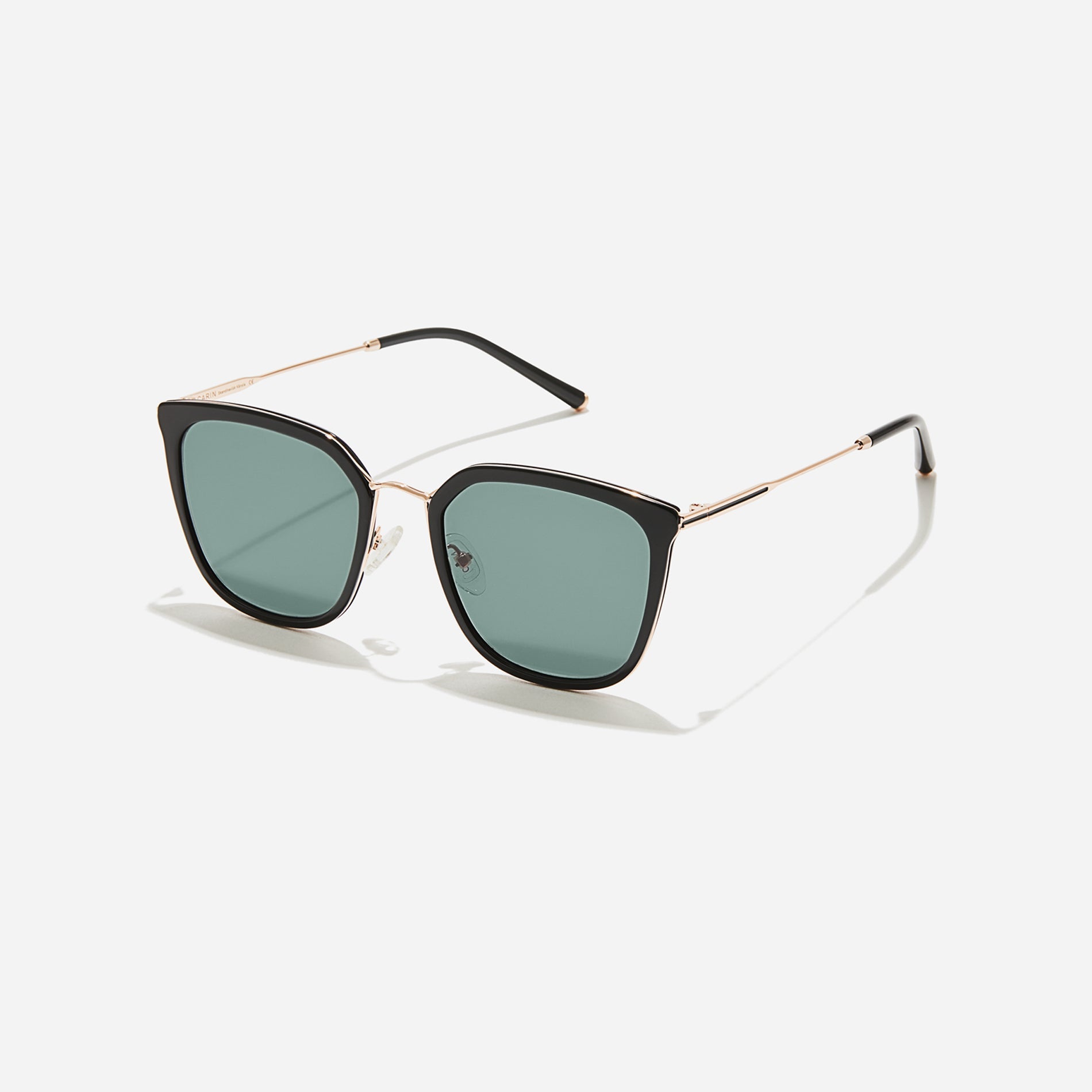 Combination sunglasses featuring flat lenses that ensure 100% UV protection, and unique nose bridge details.