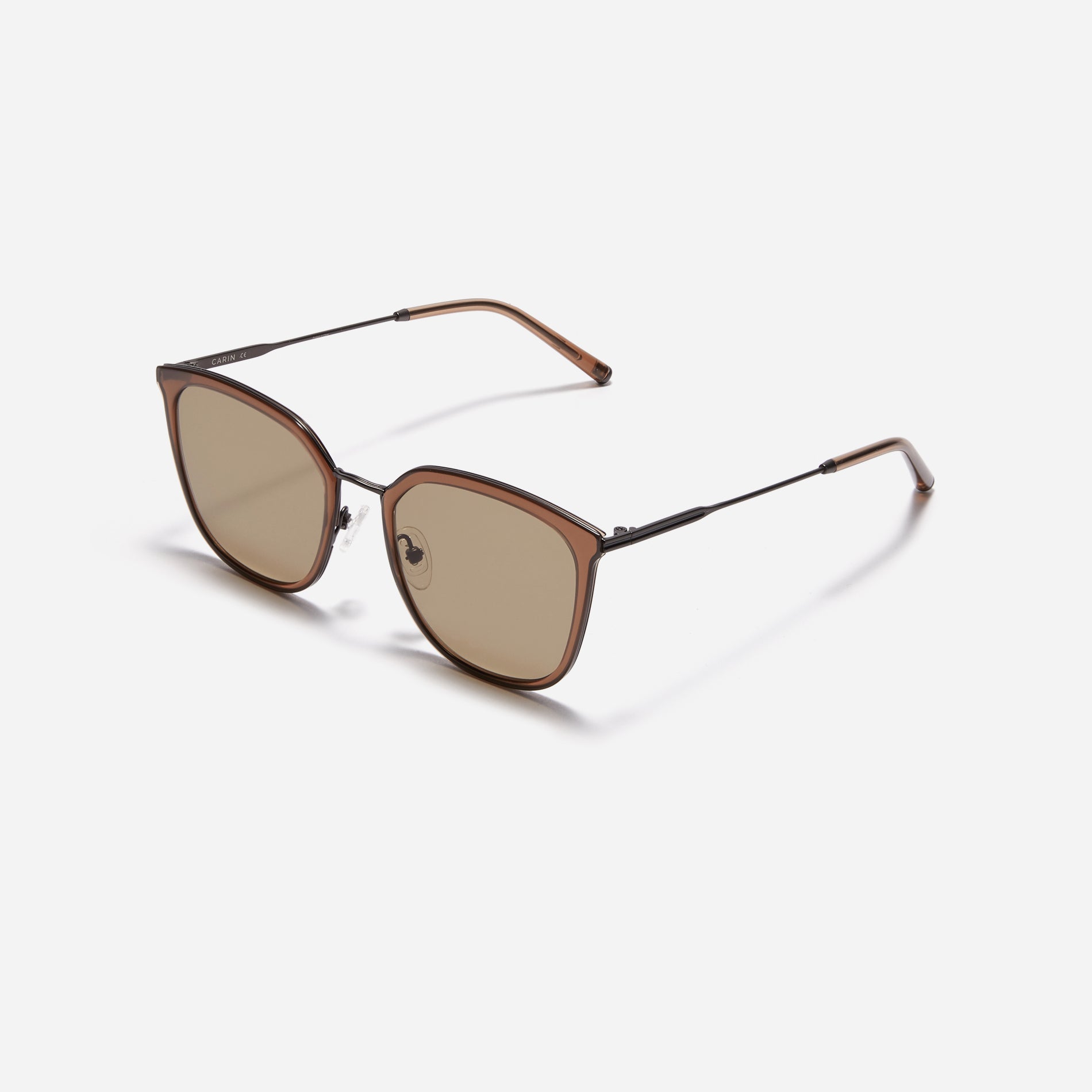 Combination sunglasses featuring flat lenses that ensure 100% UV protection, and unique nose bridge details