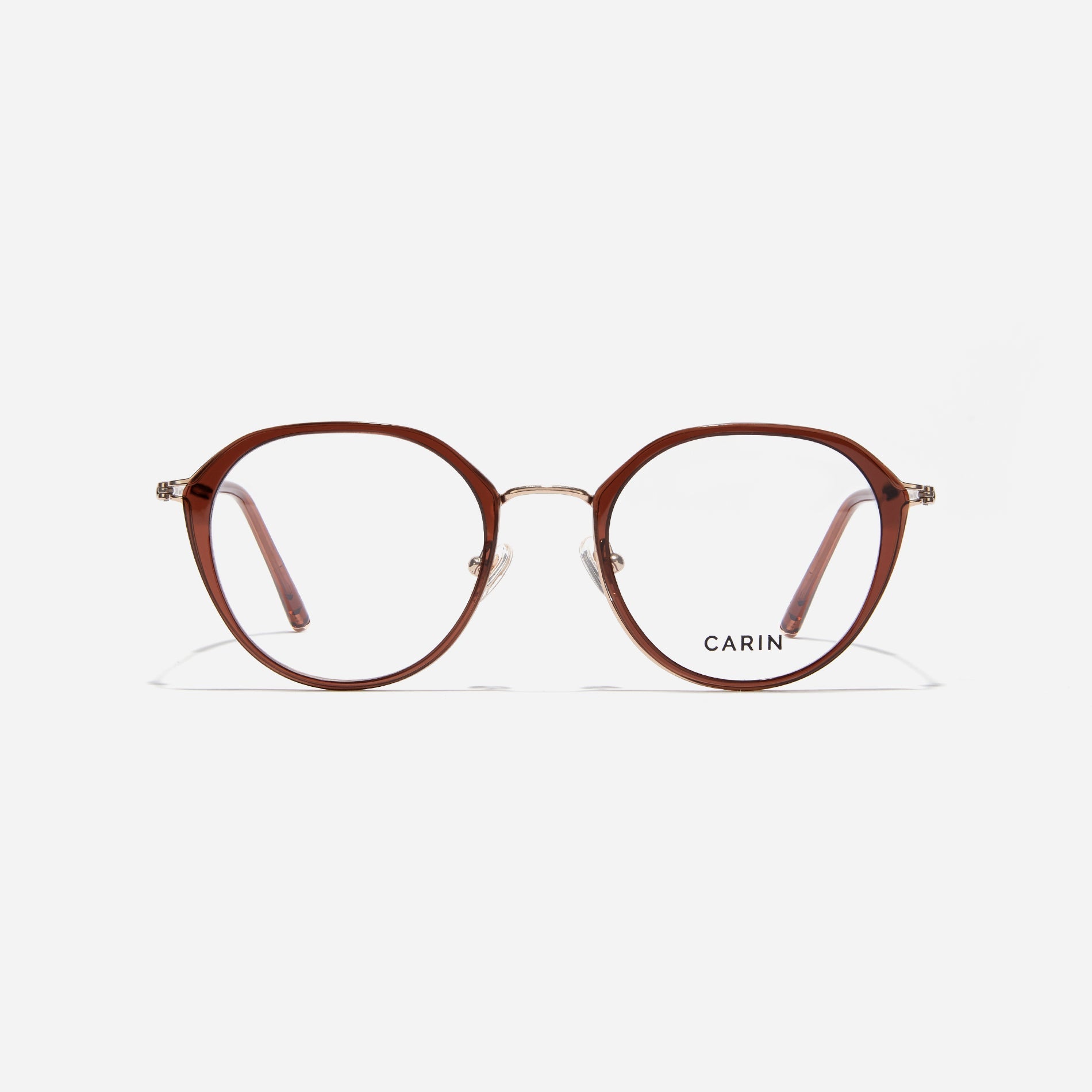Polygonal-shaped eyeglasses that feature a contrasting round lens design, offering a smooth yet refined style. They provide a comfortable wearing experience with slim temples made from lightweight and elastic B-Titanium material.