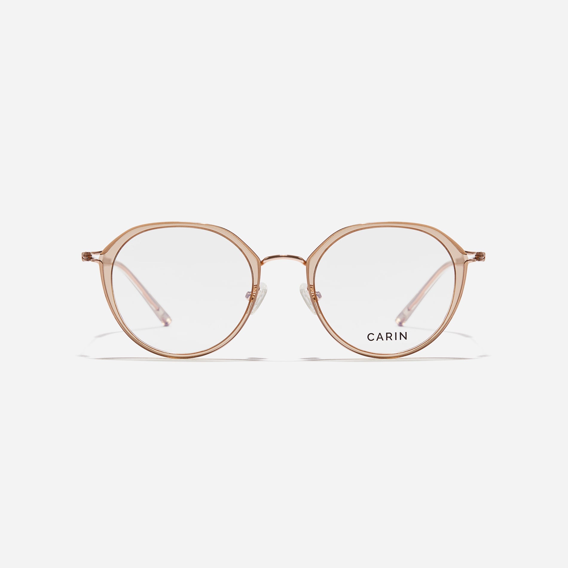 Polygonal-shaped eyeglasses that feature a contrasting round lens design, offering a smooth yet refined style. They provide a comfortable wearing experience with slim temples made from lightweight and elastic B-Titanium material.