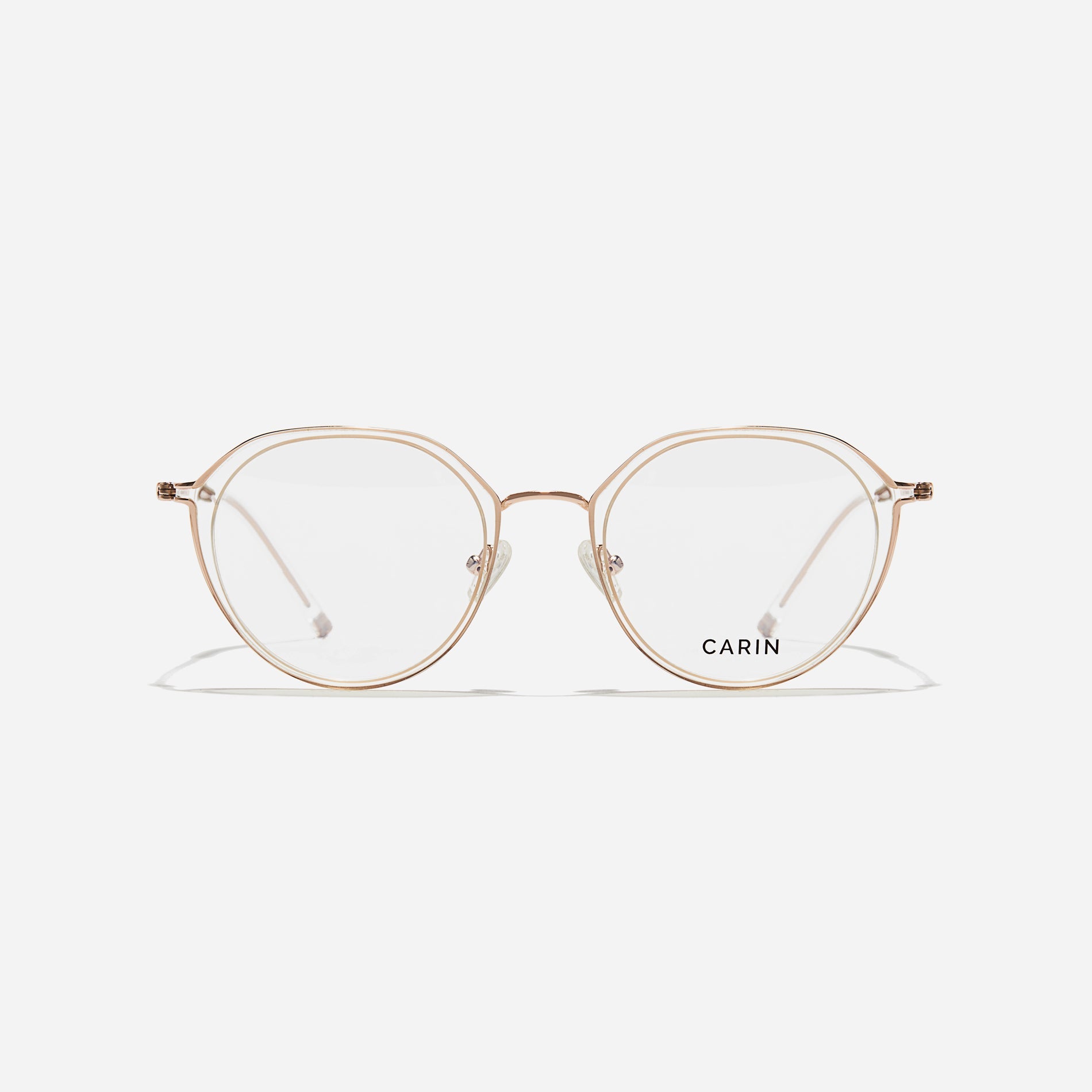 Polygonal-shaped eyeglasses that feature a contrasting round lens design, offering a smooth yet refined style. They provide a comfortable wearing experience with slim temples made from lightweight and elastic B-Titanium material.
