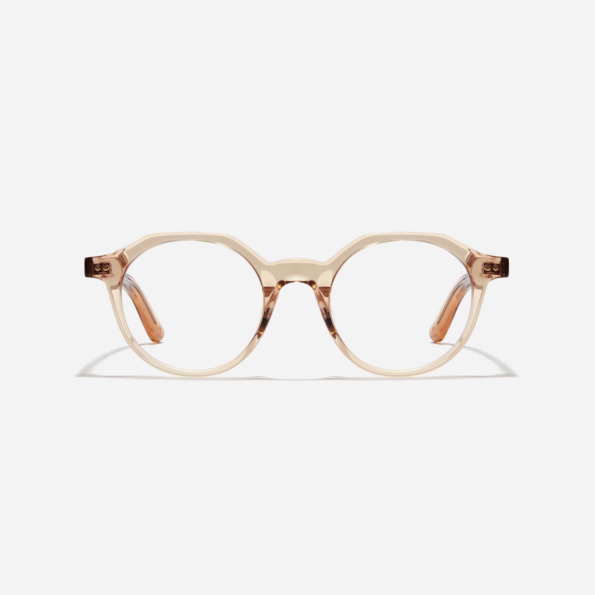 Polygon-shaped horn-rimmed eyeglasses. Embodying a modern reinterpretation of '90s retro vibes, their design is created for effortless styling.