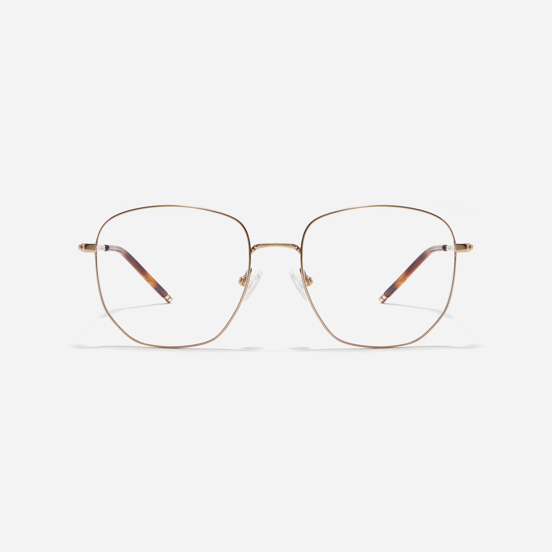 Square-shaped Boeing-style oversized eyeglasses crafted entirely from titanium for a lighter and more comfortable fit. With classic color options and frame design, these eyeglasses offer a retro style that effortlessly complements one's look.