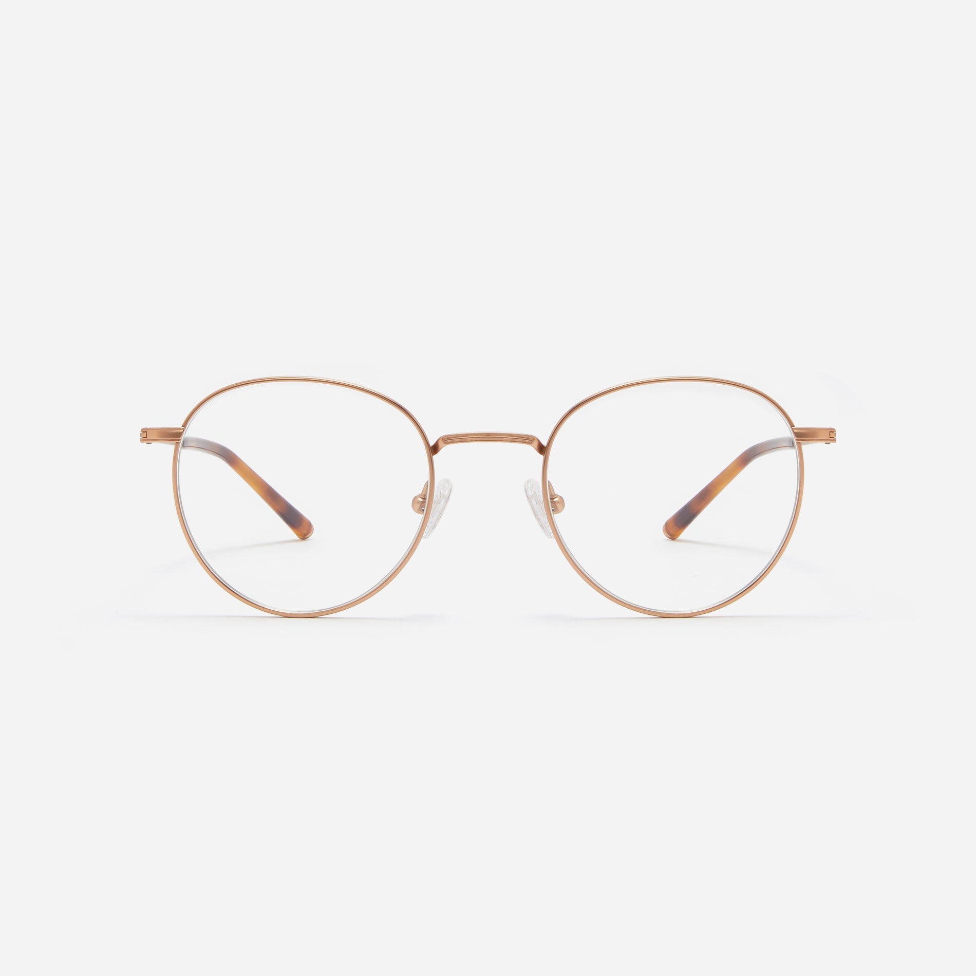 Round-shaped blue light blocking eyeglasses. Crafted entirely from pure titanium, they offer a lightweight and comfortable wearing experience.  The three-dimensional lining details on the frame and temples, combined with epoxy and matte plating, enhance its classic ambiance. 