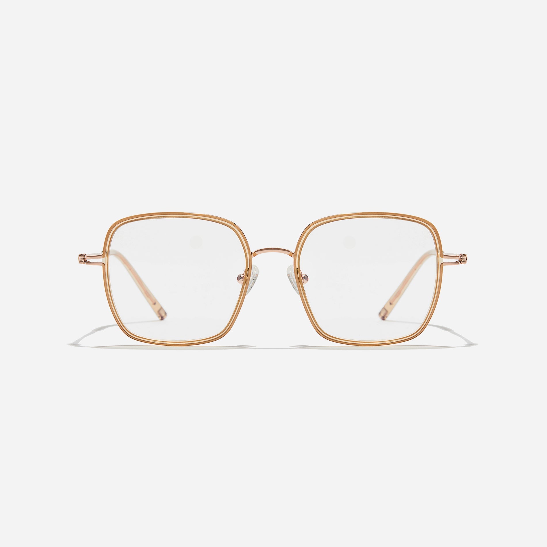 Rectangular-shaped oversized eyeglasses  characterized by a delicate acetate rim that secures the frame and hinge details.  The slim temples, made from lightweight and elastic B-Titanium material, ensure a consistently comfortable fit.