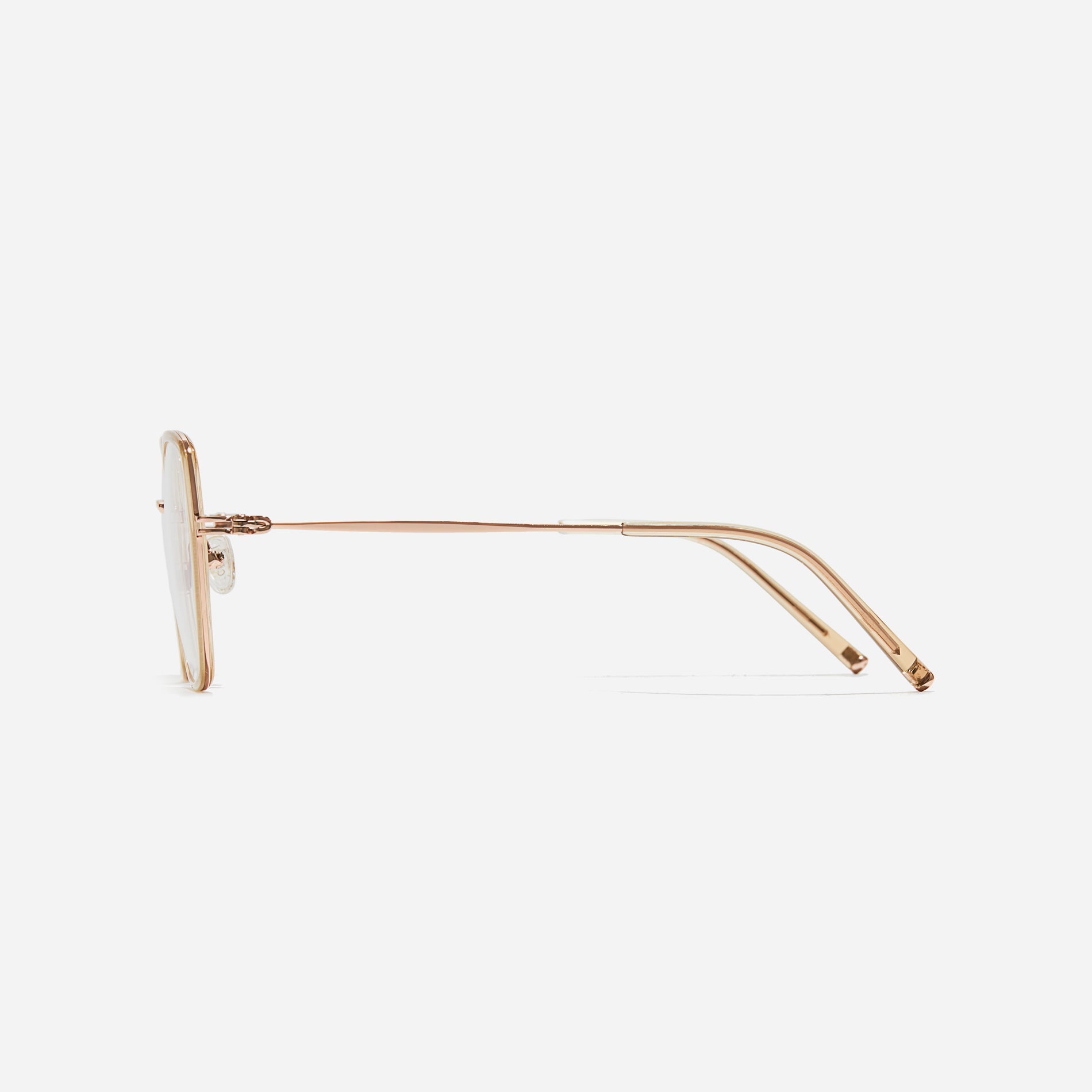 Rectangular-shaped oversized eyeglasses  characterized by a delicate acetate rim that secures the frame and hinge details.  The slim temples, made from lightweight and elastic B-Titanium material, ensure a consistently comfortable fit.