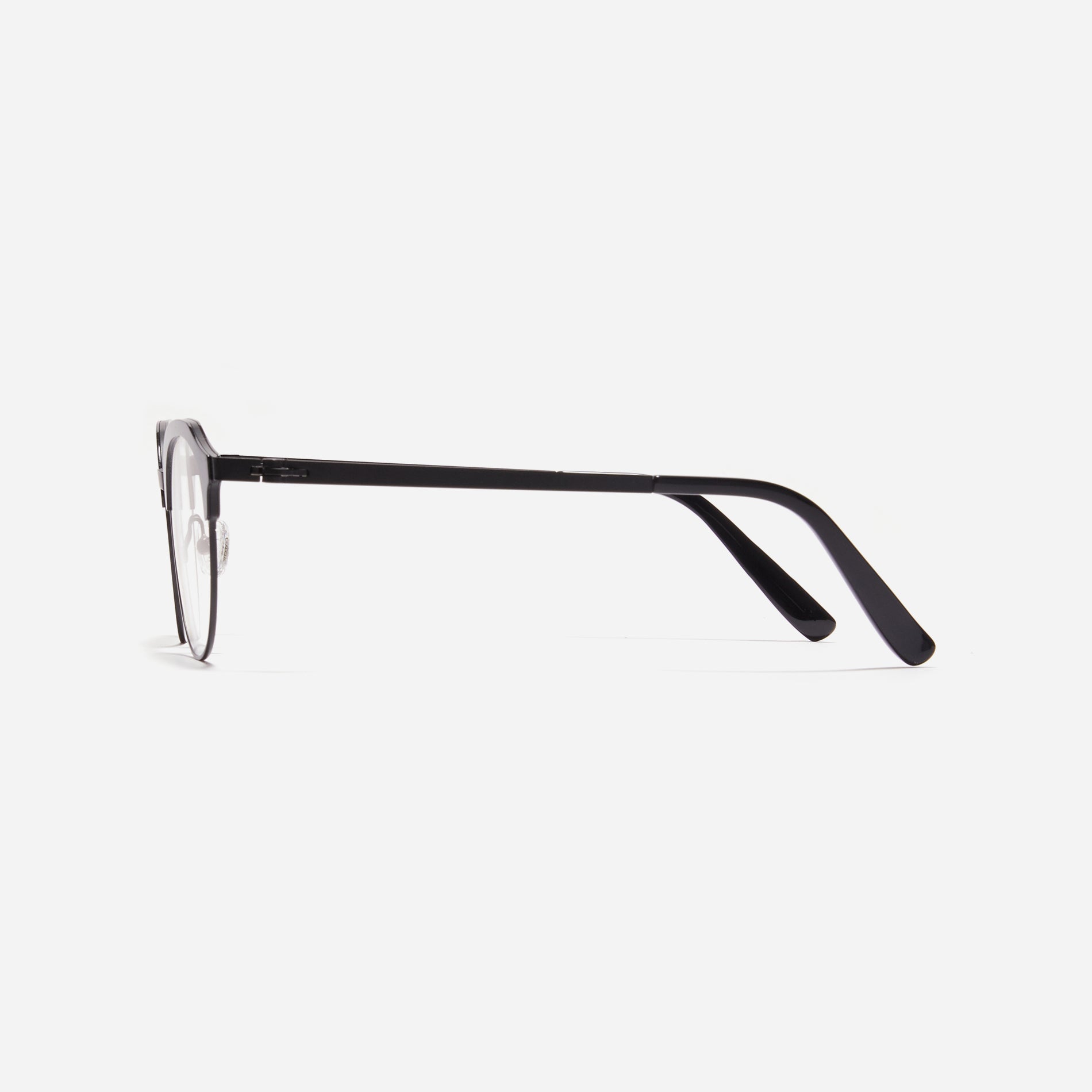 Lightweight polygon-shaped eyeglasses from CARIN's 'Feather Fit' line, offering a contemporary twist on the classic browline design. 